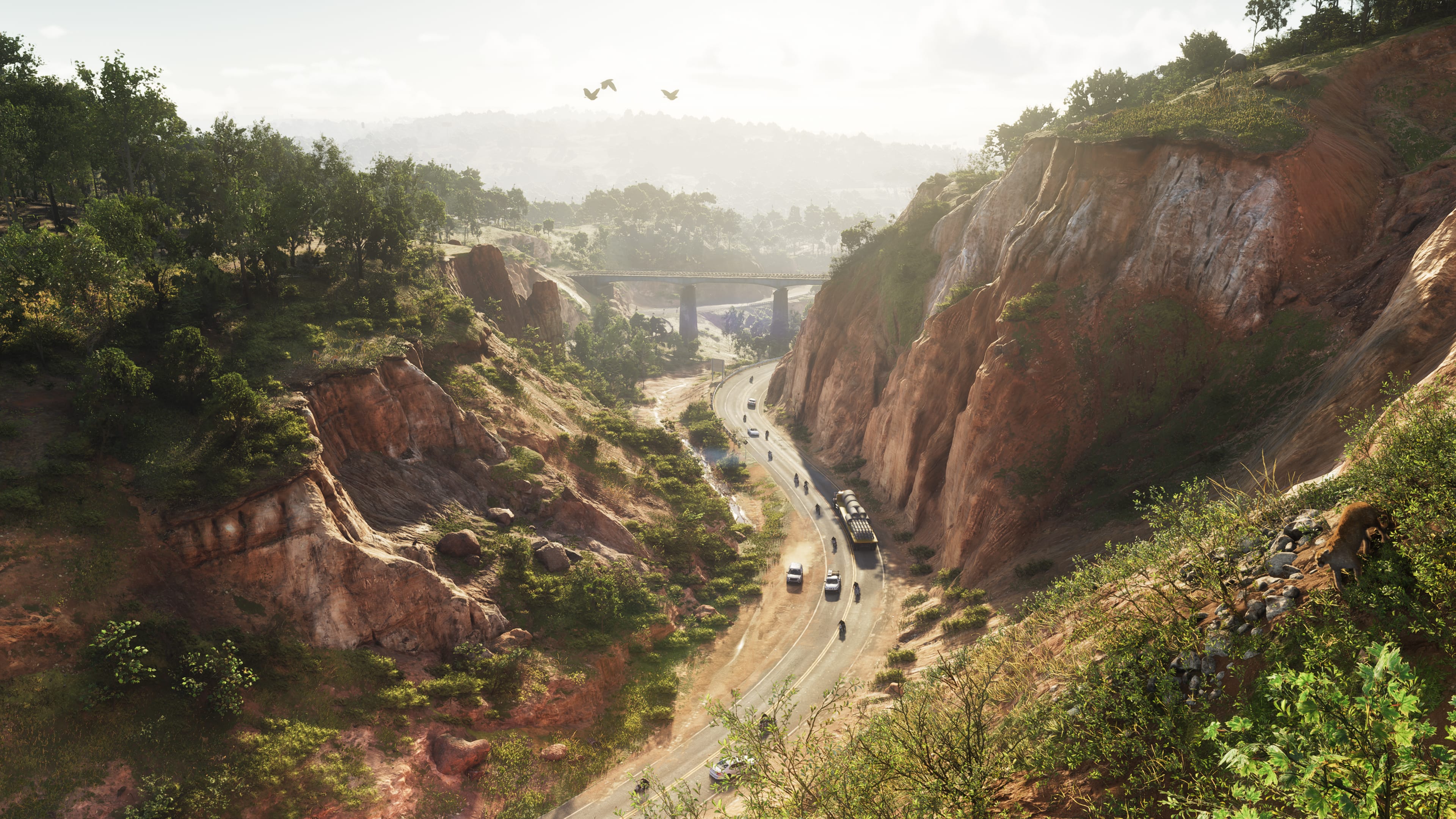 A winding road passing through rocky, forested terrain in Mount Kalaga National Park in GTA 6.